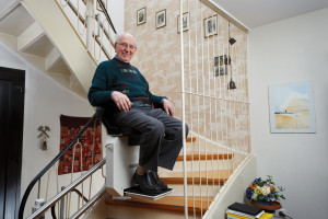 grandfather using the stairlift